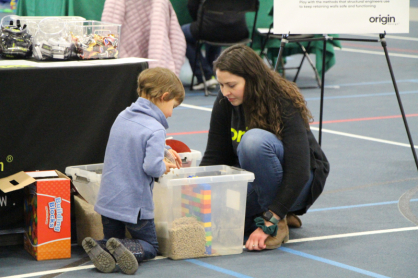 Student with a small child.