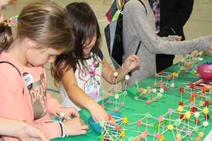 Participants worked with Girls Scouts to build structures.